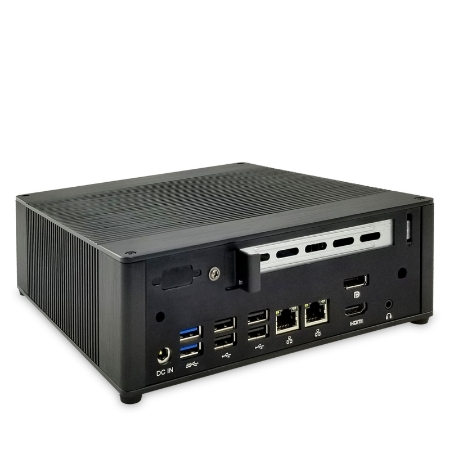 Front view of a compact mini PC showing multiple USB ports, Ethernet jack, audio jacks, DC power input, and a PCIe expansion slot cover on the front panel.