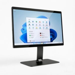 Slim black computer monitor on a stand displaying a Windows 11 desktop with the Start menu open against a white background.